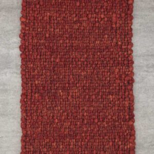 Detailaufnahme eines Haro Teppichs in Naturweiß aus reiner Schurwolle. Die Makroansicht zeigt die präzise Webtechnik ohne Knötchen und das plastische Muster der Hoch-Tief-Struktur, die für eine lebendige, helle Optik sorgt.